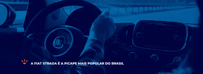 A picape mais vendida no Brasil Motorista dirigindo um Fiat Strada